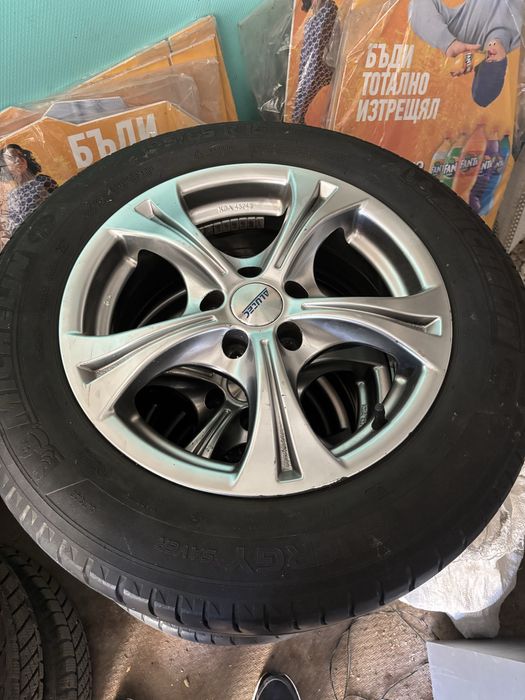 Джанти с гуми 5х100. 15 ки