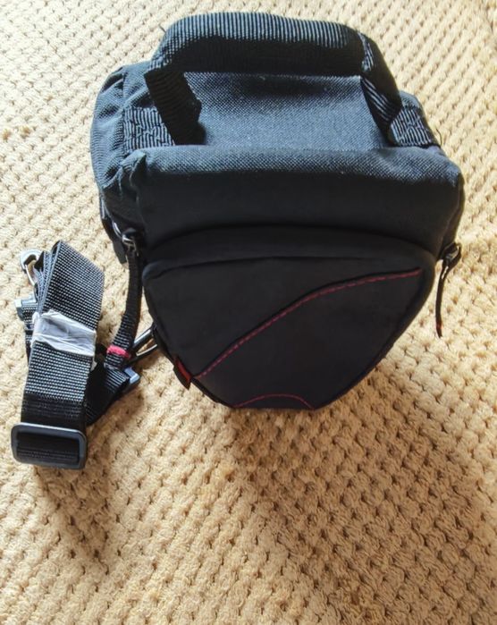 Чисто нов калъф за фотоапарат или камера.