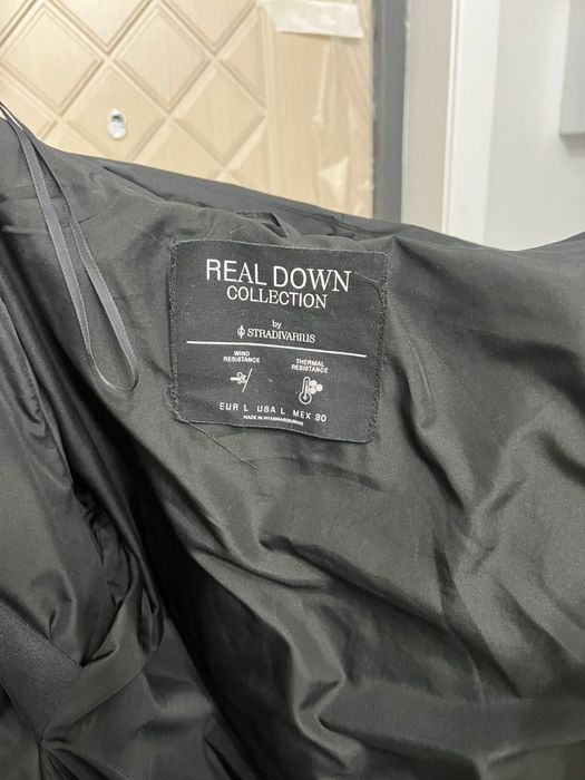 Зимняя куртка от Stradivarius.