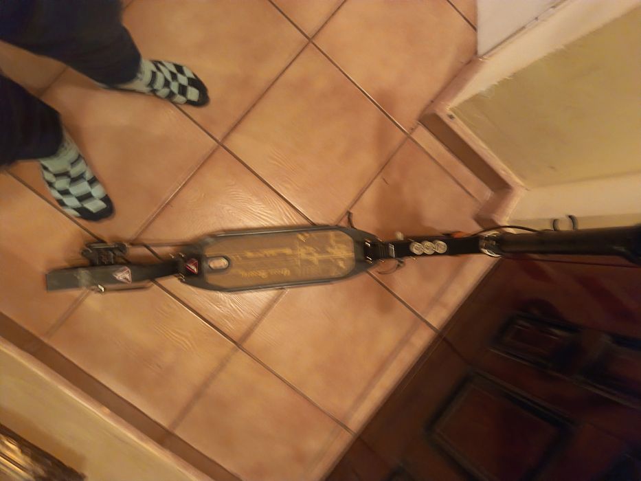 Trotineta copii cu suspensii fata spate frane pe disc putin folosita