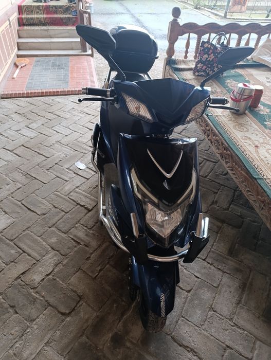 Срочно продам 500 доллар Скутер дугали 75_ 80 км бир заряд бн юради