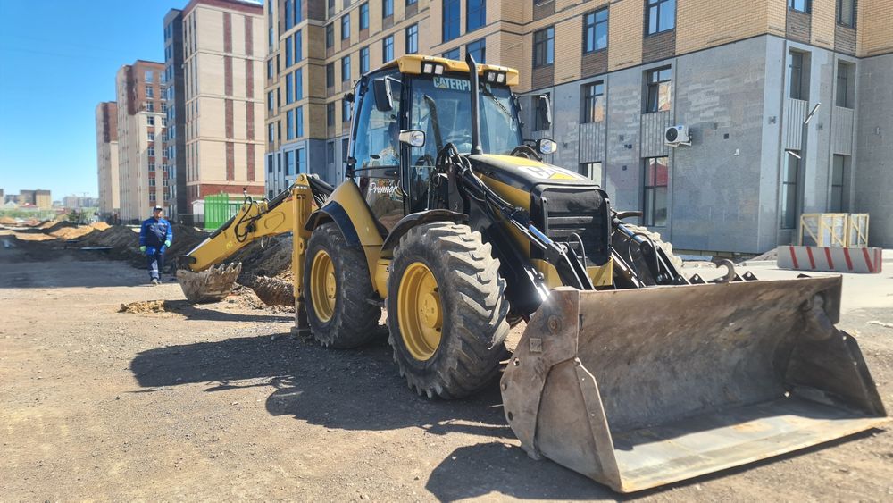 Экскаватор погрузчик