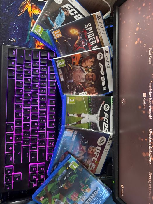 Плейстешън 5 с два джойстика и шест з игри