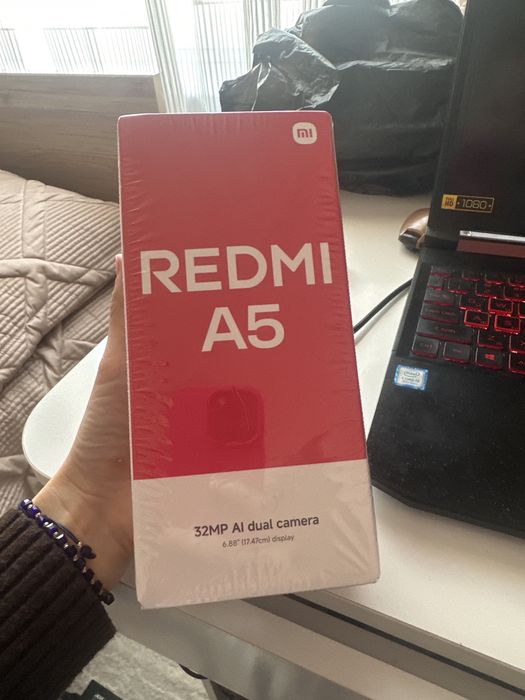 Продам телефон Redmi A5 новый упаковна