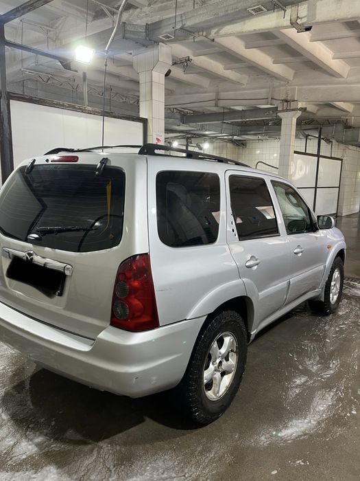 Продам Mazda Tribure