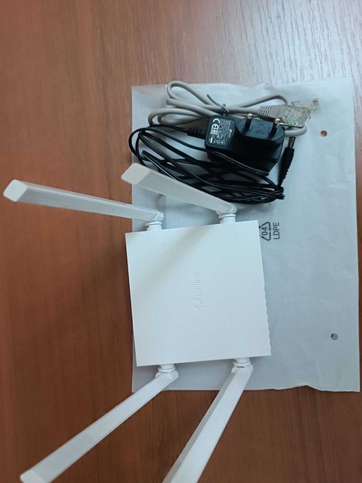 Продам не дорого Роутер tp-link C24               .