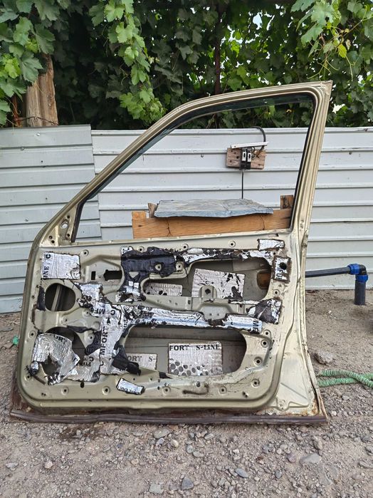 Двери нексия 2009