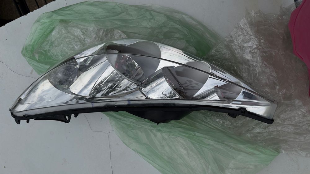 Ляв фар за Peugeot 206+ TYC