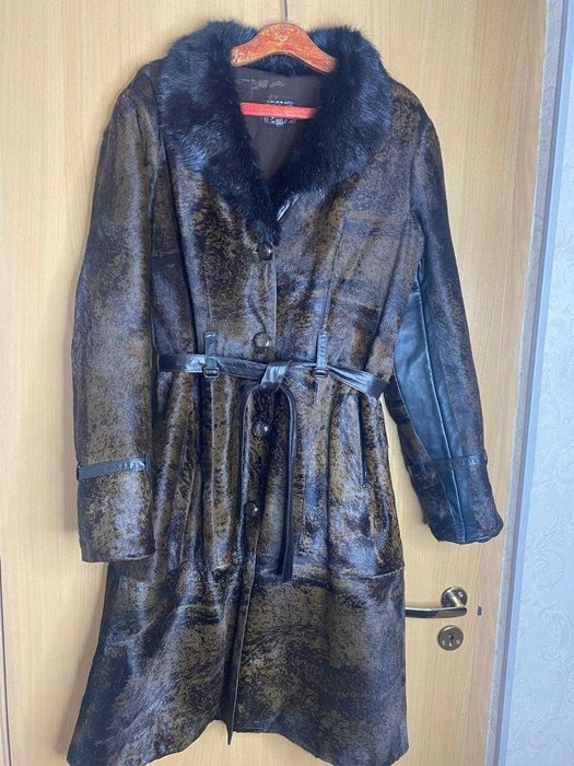 Продам женское пальто 52 размера