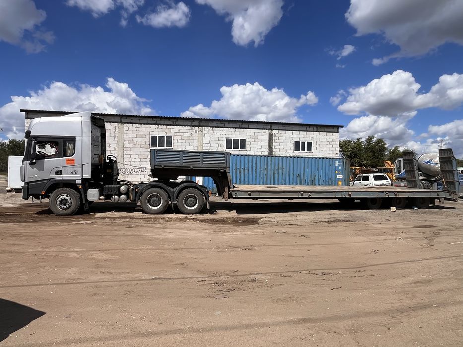 Трал перевозка спецтехники укладчик каток