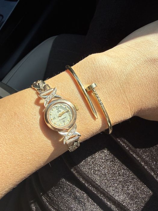 Золотые женские часы