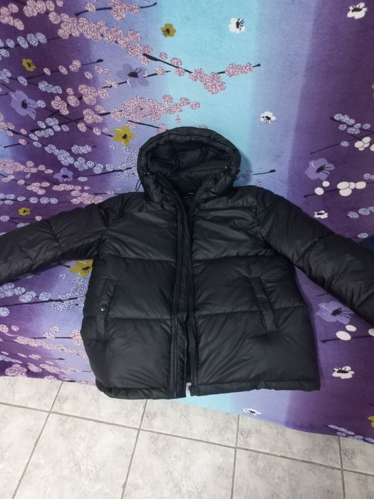 Продам пуховик новый