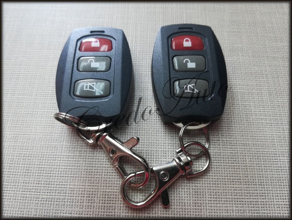 Промо!Автоаларма Octopus YK16. Две дистанонни+вдигане на стъкла+багаж.