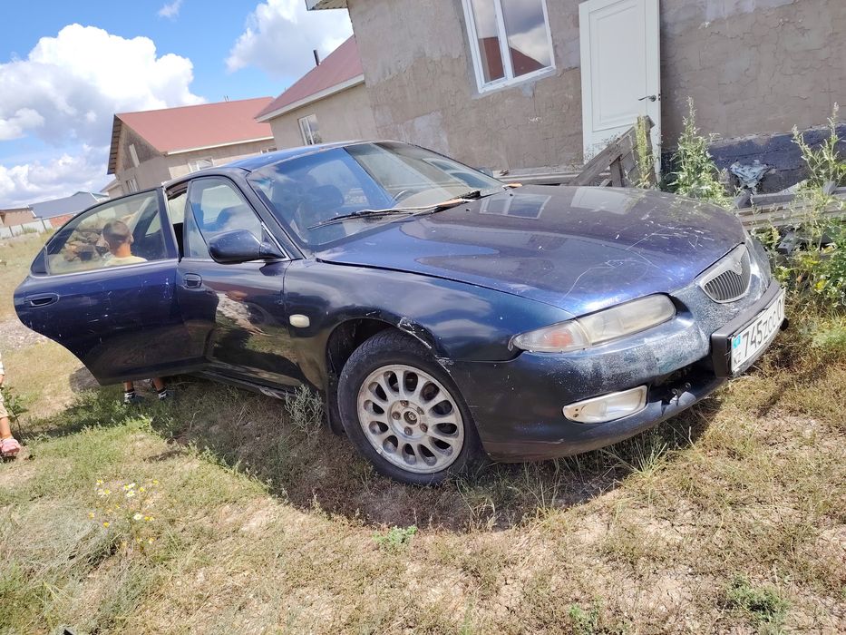 Капот багажник двири диски на мазду