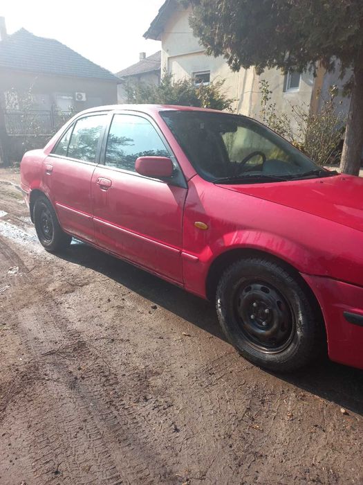 Мазда 323 90 к.с