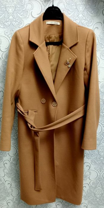 Женский пальто..