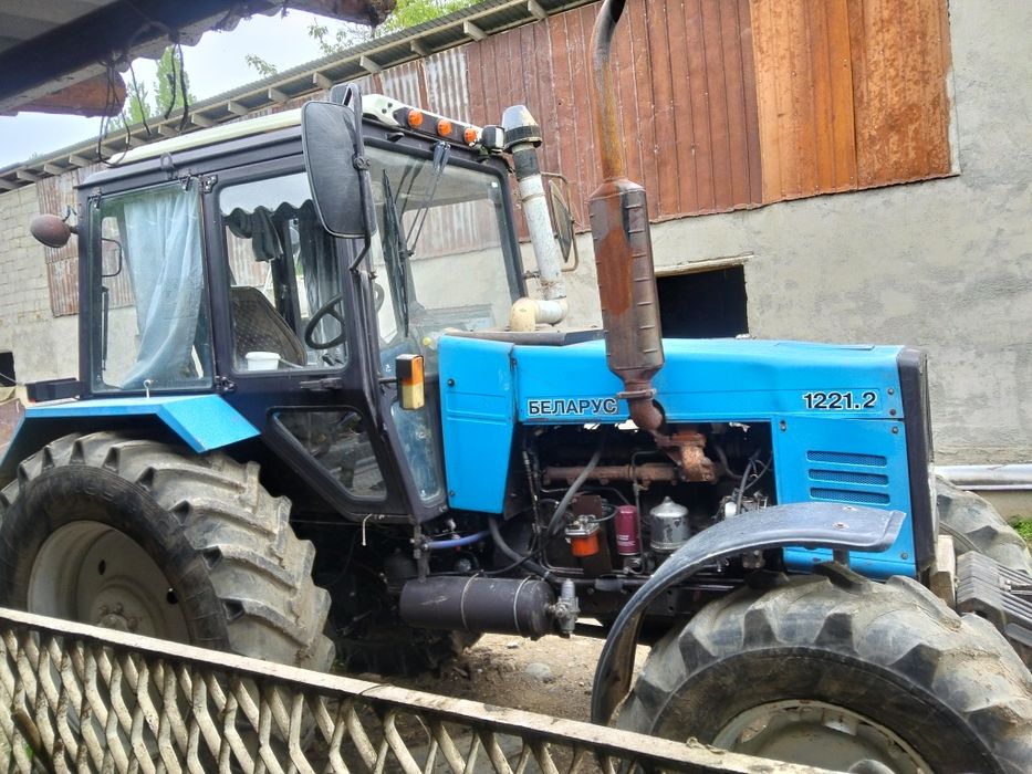 Трактор 1221 и соха 5 корпусны