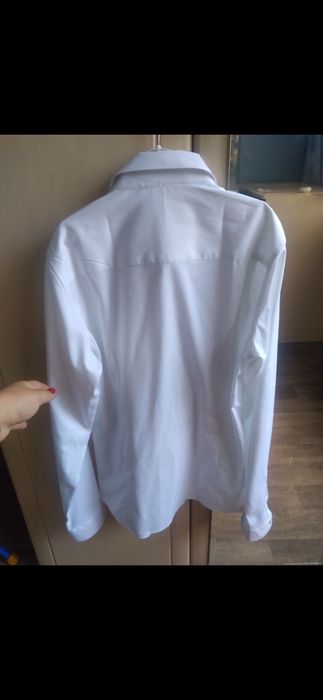 Продам рубашку на мальчика рост 158