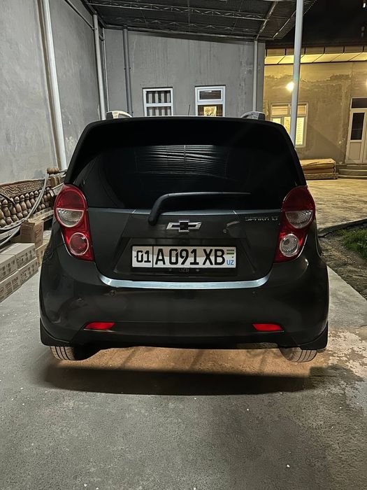 spark style tomi qora