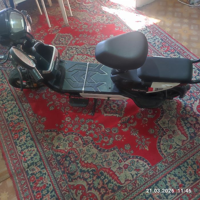 Электроскутер на ходу