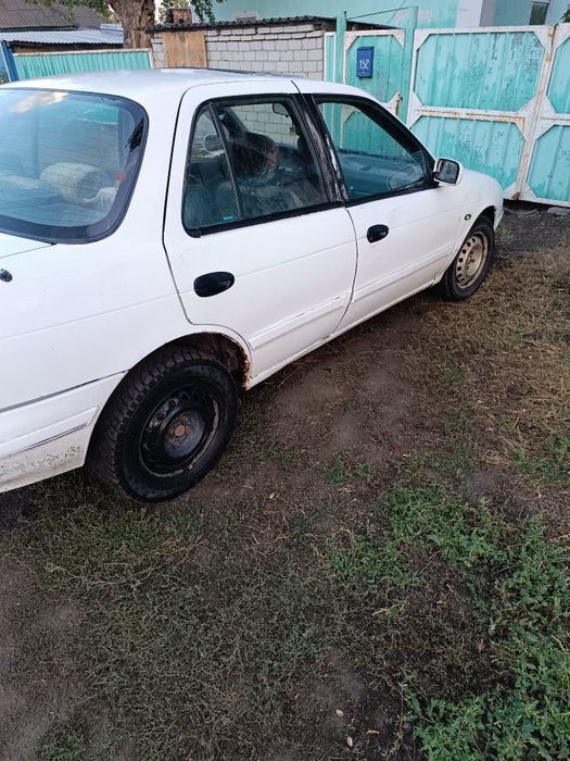 Автомобиль киа сепия