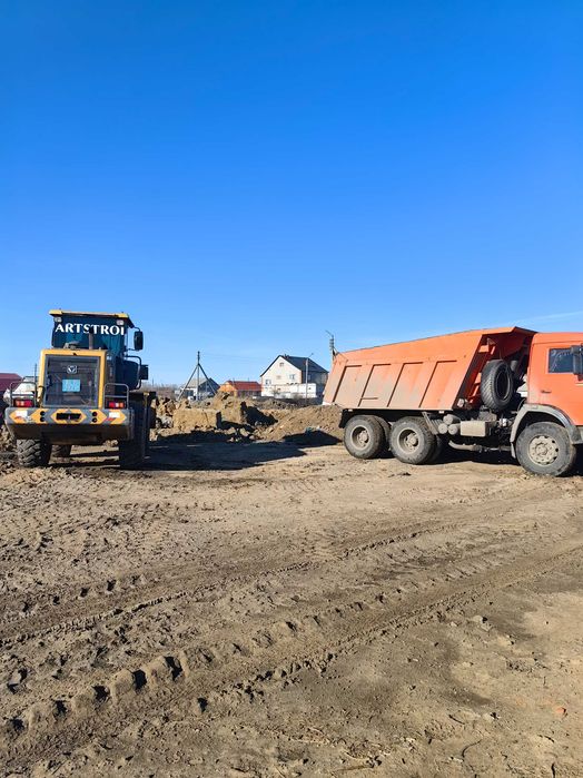 Погрузчик Фронтальный ковшовый.