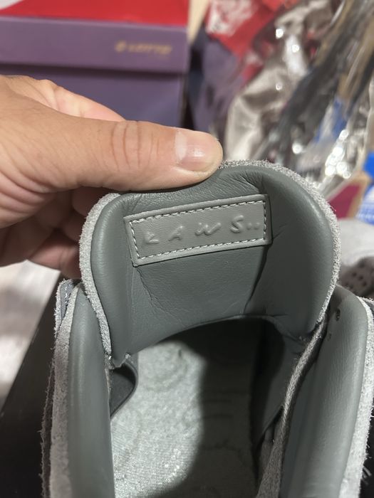 Jordan 4 Kaws "Grey"