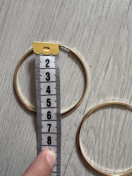 Продам золотые серьги 7,48