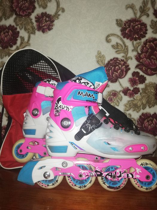 Роликовые коньки