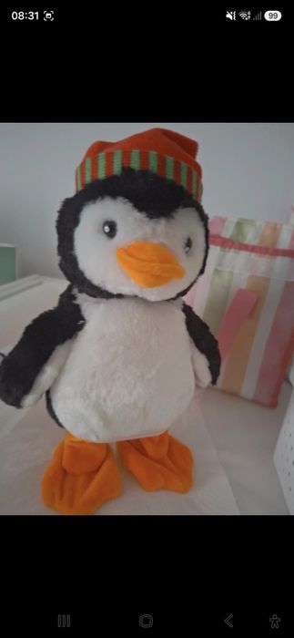 Pinguin dansator cu melodii