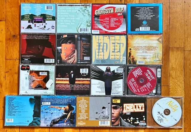 CD orig hip hop: Snoop Dogg, 50 Cent, Beastie Boys, Akon, Jay-Z, W. Jean, Coolio, 2Pac