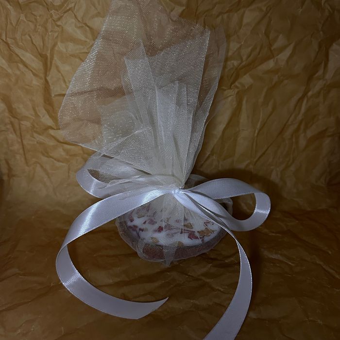 Lumânare parfumată în coajă de nucă de cocos