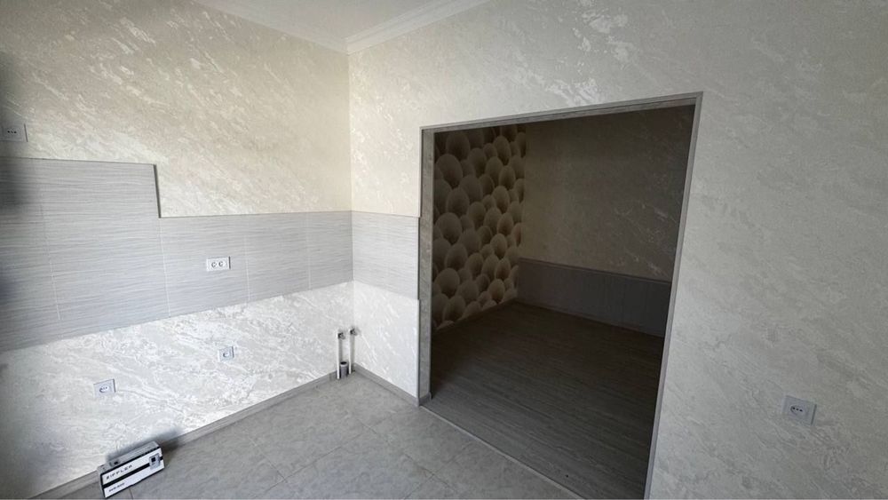 Новый коттедж с двором в Янги Хаёт Сити