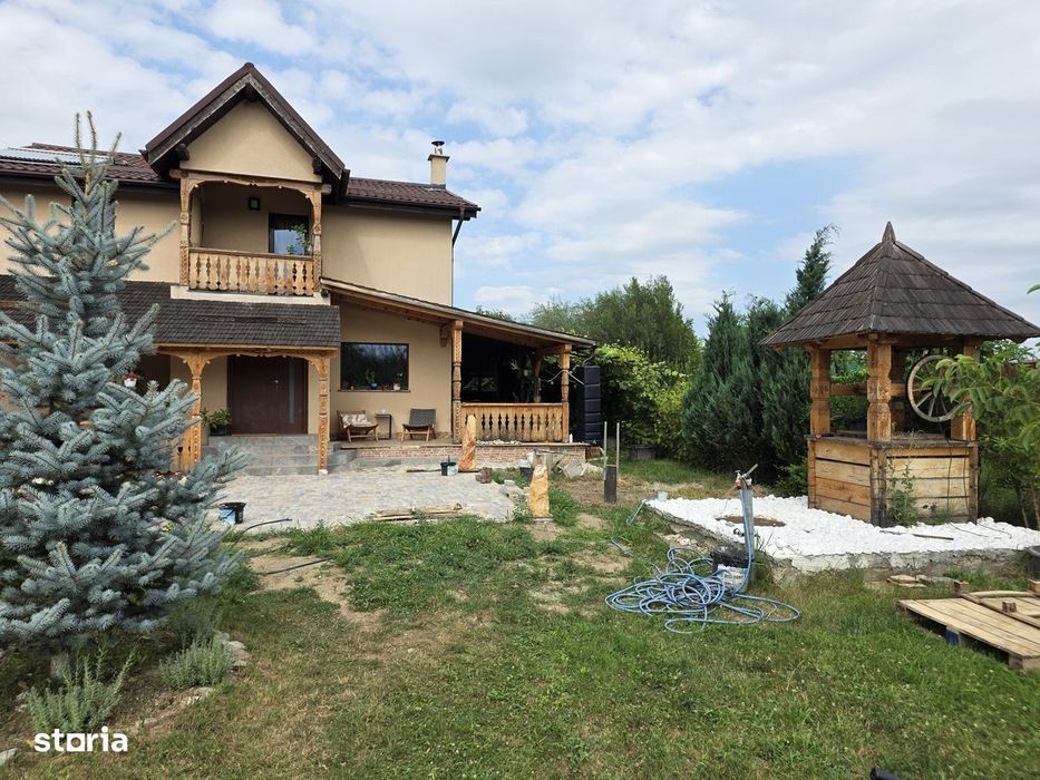 Casă cu suflet, teren de 1.000 mp și independență energetică