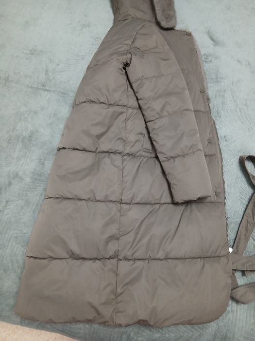 Продам пуховик новый