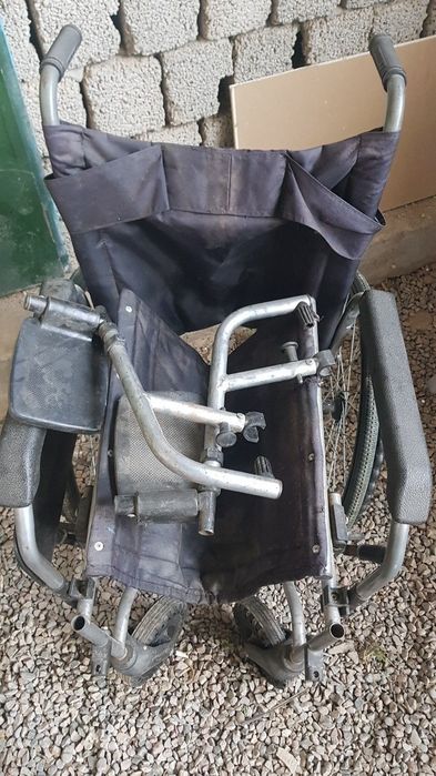 Инвалидная коляска.