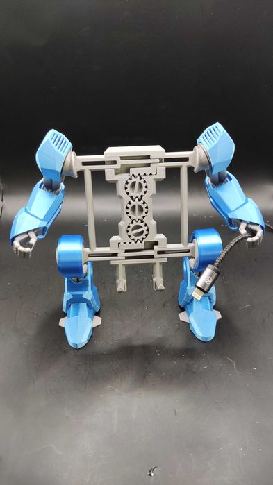 Suport Telefon Mecho Exo Suit | Mecanic Stilizat pentru Birou