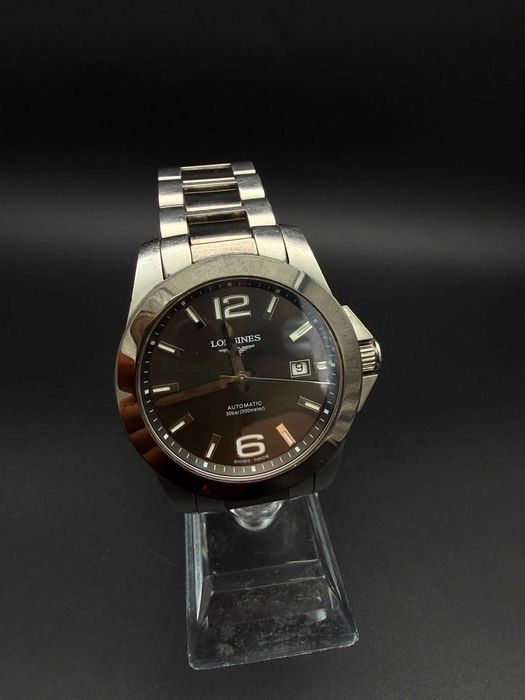 Dracula Amanet: Ceas Longines Conquest Automatic, 41mm, Bratara Otel, 300m, Swiss Made.