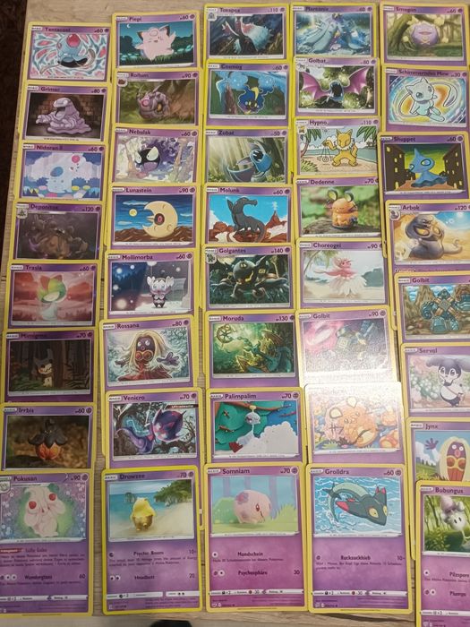 600 de cărți pokemon originale + patru cutii de metal