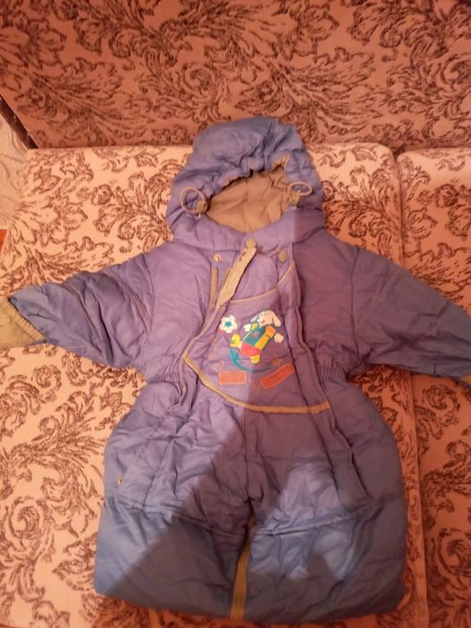 Продам комбинезон на пуху