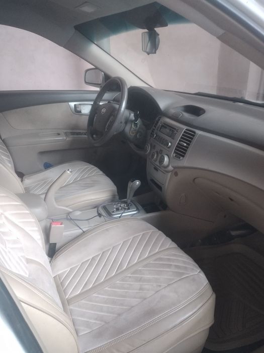 Кия оптима 2007йил срочни сотилади