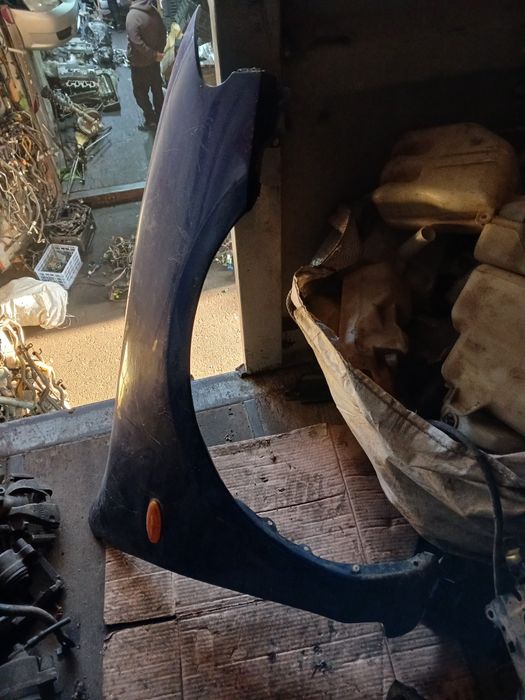 Крыло Мазда 323 седан 1996г в оригинале