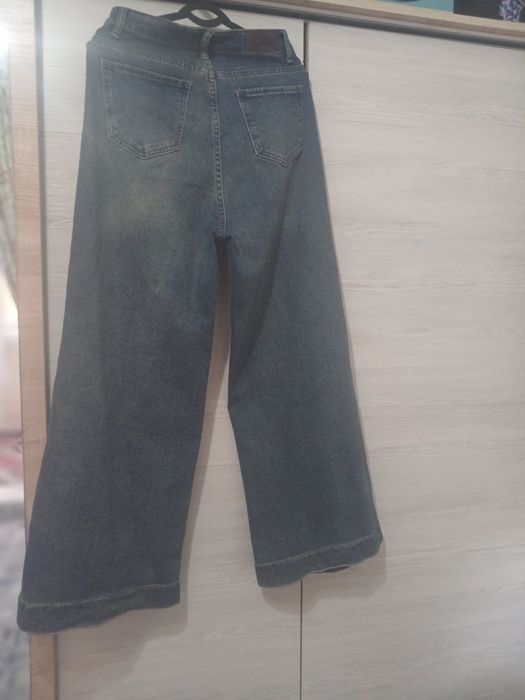 Женские брюки джинсы