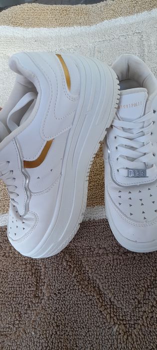 Bershka platform sneakers with Metallica details