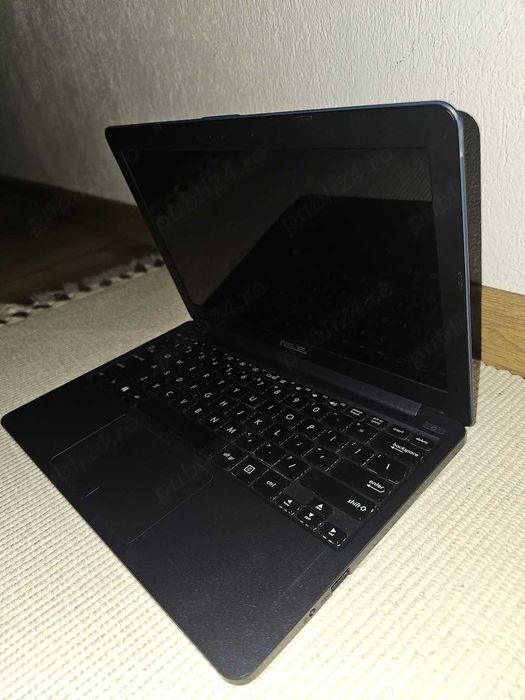 Mini Laptop ASUSTeK COMPUTER INC E203NA cu procesor Intel(R) Celeron(R) CPU N3350