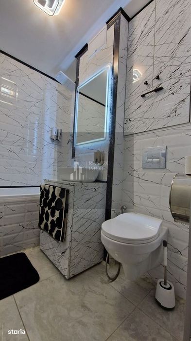 Garsoniera 31mp renovata-mobilata lux -metrou Titan - Piata Minis