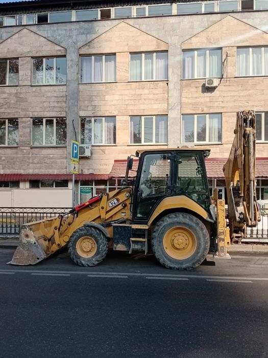 Услуги экскаватора погрузчика