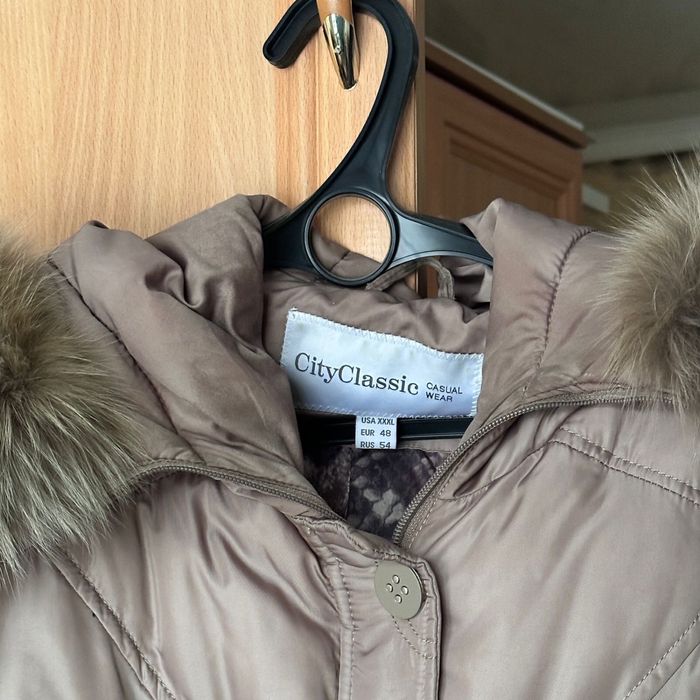 Зимний пуховик 54 размера.