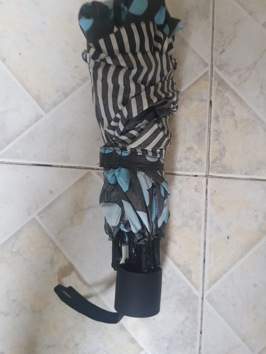 Umbrela de ploaie pentru o persoana