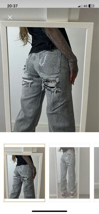 Blugi gri cu model pe spate